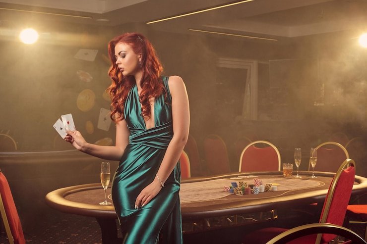 Mobile phone screen showing roulette betting interface with live dealer feed and chat panel